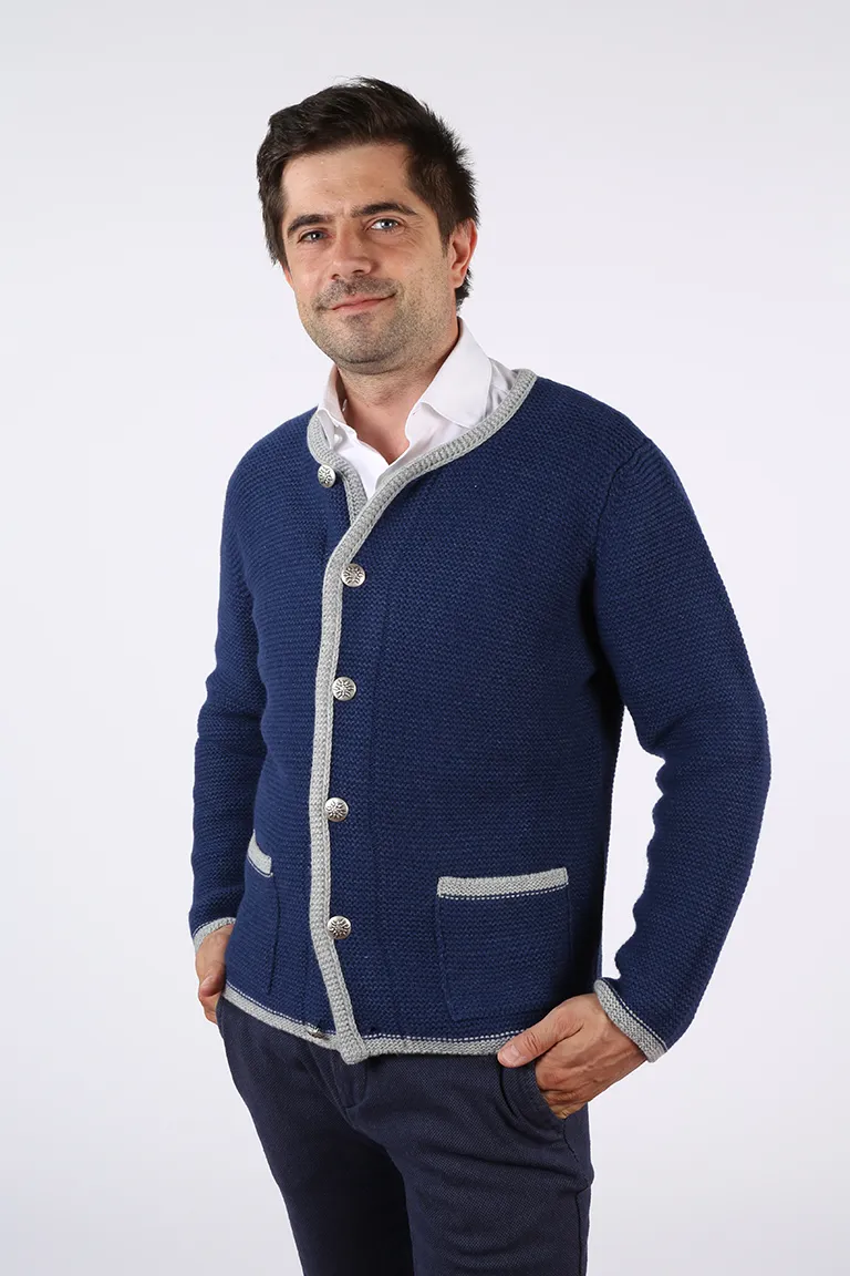 Giacca tipica tirolese da uomo con tasche e bottoni con stella alpina in lana shetland